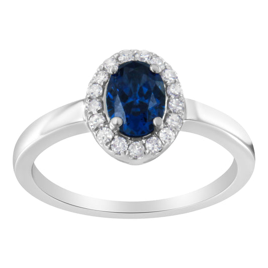 Cocktailring aus 10 Karat Weißgold, 1/5 Karat Diamant und blauem Saphir